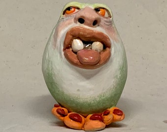 Egg Head Rattler - Slab built, hand altered and sculpted ceramic gazing ball. Just a friendly face to enjoy in your home.