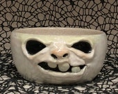 Small ceramic Ghostie bowl - Wheel thrown, hand altered & sculpted. Just a friendly face to hold soup, ice cream, cereal, favorite candy.