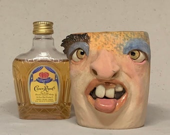 SHOT GLASS - Ready to ship - wheel thrown, hand altered and sculpted. A friendly face to enjoy your favorite beverage.