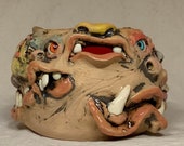 Monstrosity Creamer - Eight-faced, wheel thrown, hand altered and sculpted creamer.  Just a friendly face to enjoy with your coffee with.