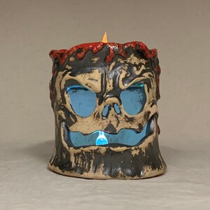 HAUNTED CANDLE -  Ready to ship - slab rolled, hand altered and sculpted. Just a friendly fella to help you light up your life.