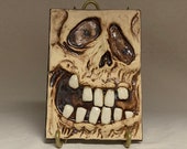 SCULPTED TILE - Hand sculpted tile. What a cute little guy to hang on your wall at Halloween or all year long.