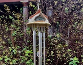 WIND CHIME - Hand sculpted. Hang this lovely piece outside & see who comes to visit your patio or garden.
