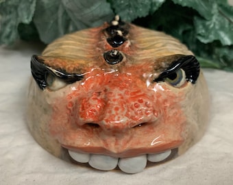 Garden Guardian - Ready to shipWheel thrown, hand altered & sculpted.  A friendly face to guard your garden, potted plants or hide your keys