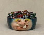 REALLY SMALL BOWL-Ready to ship -Wheel thrown, hand altered & sculpted. A friendly face to hold a dieters portion of ice cream, or candy.