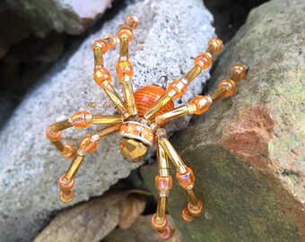 SPIDER - made of beads & wire, these little guys can hang or just sit on your desk. You could even wear as a necklace.