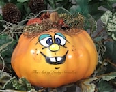 PAINTED FANCY PUMPKIN - Painted and decorated hard foam pumpkin. Just a friendly face to brighten your day for Halloween and Thanksgiving.