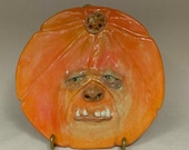 PUMPKIN PLATE - Wheel thrown, hand altered and sculpted ceramic plate or wall hanging. A friendly face to enjoy for the holiday season.