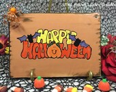 HALLOWEEN TILES - Slab built, hand etched and glazed tiles.  Just a friendly face to brighten your day.