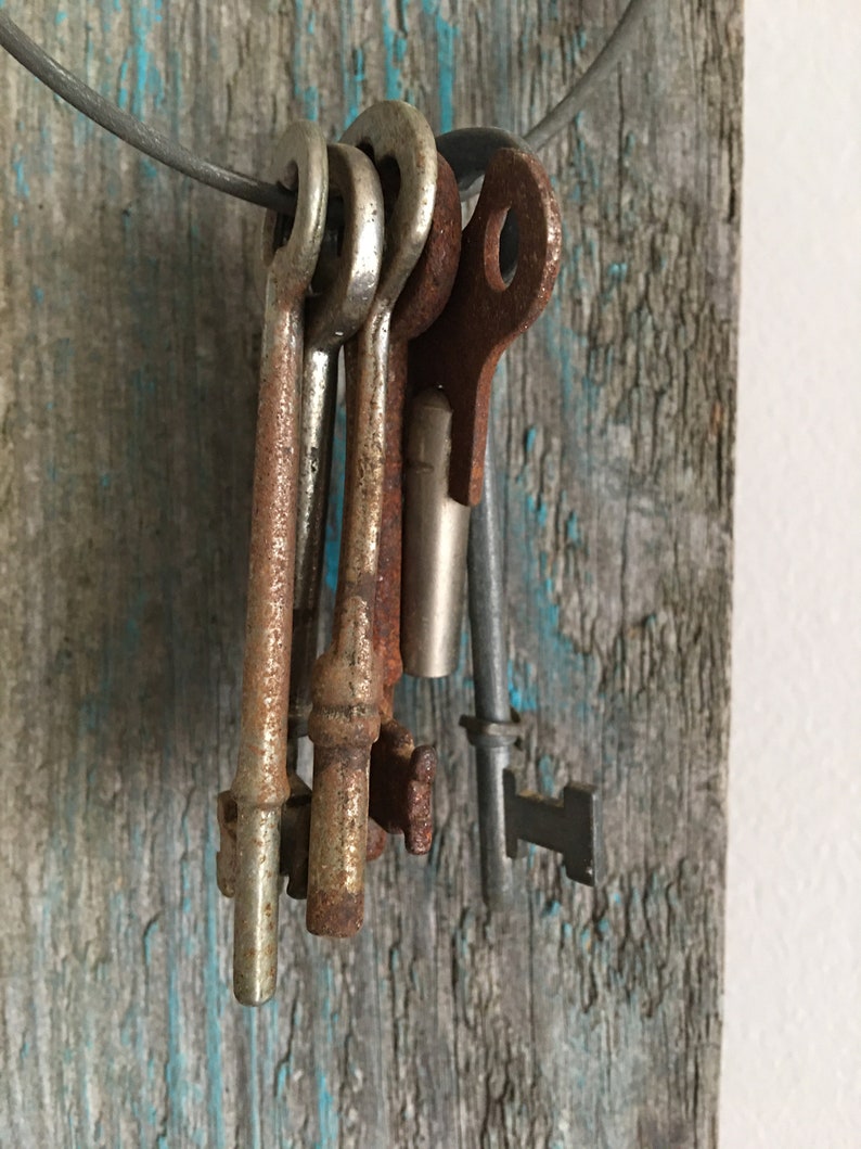 old piece of board vintage skeleton keys on rustic board and hook vintage keys free shipping vintage hook