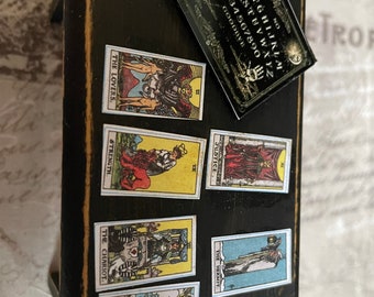 miniature haunted house furniture, tarot cards  and ouija board on a table  free shipping
