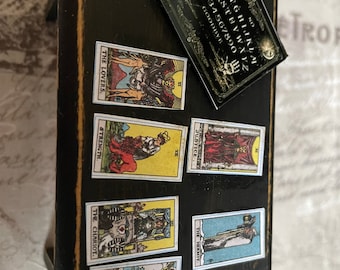 miniature haunted house furniture, tarot cards  and ouija board on a table  free shipping