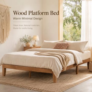 May include: A light brown wood platform bed frame with a beige duvet, two matching pillows, and a textured terracotta-colored throw pillow. Text on the wall reads: Wood Platform Bed, Warm Minimal Design, Clean lines. Natural materials. Made for restful living.