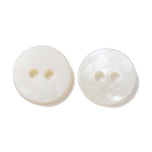 May include: Two round, white buttons with two holes each. The buttons have a pearlescent sheen and are set against a white background. These buttons are suitable for sewing projects and garment construction.