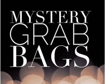 May include: Black and white text on a black background that reads "Mystery Grab Bags".