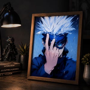 May include: A framed anime-style illustration of a character with spiky white hair and a dark blue blindfold covering their eyes. One hand is raised to the face, revealing a single glowing blue eye. The character wears a dark blue high-collar jacket.