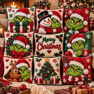 May include: A collection of nine square throw pillows featuring textured crochet designs of a green character in a Santa hat, a snowman, a Christmas tree, and a dog, with some pillows displaying the text Merry Christmas in red script.