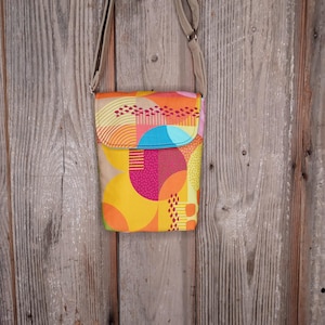 Bold printed fabric remnant small cross body handbag
