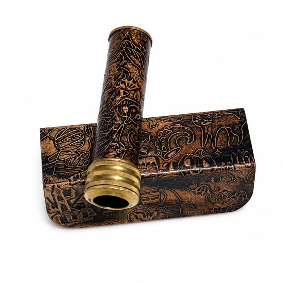 A fully handcrafted brass kaleidoscope with embossed leather case — the kind of desk object that makes every visitor pick it up and ask 'where did you get this?'