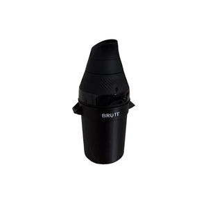 May include: A black cylindrical container with a tapered top and a spout-like opening. The body features the word BRUTE printed in white lettering. The design includes two small side tabs and a textured band around the upper section of the unit.
