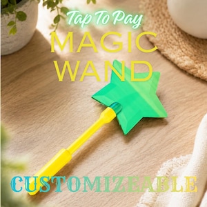 May include: A bright yellow handle attached to a green star-shaped plastic wand. The text "Tap To Pay MAGIC WAND" is printed in white and yellow, and the word "CUSTOMIZABLE" is printed in light blue at the bottom of the image.