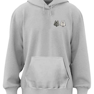 A gray hoodie with a small pocket and two cartoon wolf heads on the front.