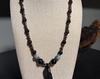 Horn carved feather, hematite, ceramic necklace