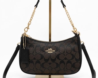 Bolsa de ombro Coach Teri em lona com estampa exclusiva, marrom/preta.