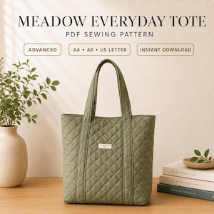 May include: A sage green quilted tote bag with two vertical straps and a small rectangular label on the front. The text above reads MEADOW EVERYDAY TOTE, PDF SEWING PATTERN, ADVANCED, A4, A0, US LETTER, and INSTANT DOWNLOAD in dark brown font.