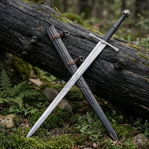 May include: A steel sword with a straight double-edged blade, a cross-shaped guard, and a black grip topped with a spherical pommel. The sword is accompanied by a matching black scabbard featuring brown leather straps and metal rings.