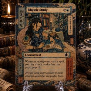 May include: A rectangular trading card titled Rhystic Study featuring an illustration of a person writing in a book. The card text reads: Whenever an opponent casts a spell, you may draw a card unless that player pays 1. Friends teach what you want to know. Enemies teach what you need to know.
