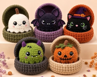 May include: Five crocheted amigurumi figures nestled in matching round containers: a white ghost, a purple bat, a black cat with a witch hat, a green monster, and an orange jack-o'-lantern. Each figure features large black eyes and stitched details.