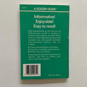 May include: The back cover of a green A Golden Guide book about spiders. It features the text: Informative! Enjoyable! Easy to read! This introduction to the diverse yet little-known world of spiders is packed with concise, accurate information. A barcode and ISBN 0-307-24021-5 are printed at the bottom.