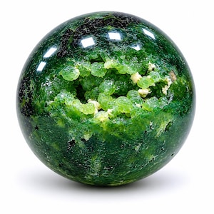 May include: A polished spherical mineral specimen featuring a deep forest green exterior with dark inclusions and a central cavity filled with vibrant, translucent lime green botryoidal crystal formations and small patches of creamy white mineral deposits.