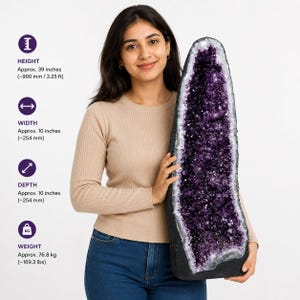 May include: A large, tall amethyst geode with deep purple, crystalline interior and a dark, rough exterior. The geode measures approximately 39 inches in height, 10 inches in width, 10 inches in depth, and weighs approximately 169.3 lbs.