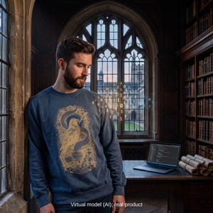 A software engineer in a historic library wearing a vintage programmer sweatshirt.