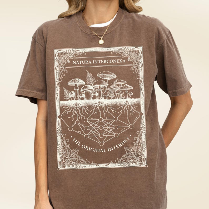 Dark brown vintage biology tee displaying a white mushroom and math nodes graphic.