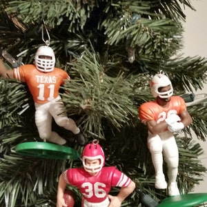 Big 12 SEC Heisman winners Steve Owens Oklahoma Sooners. Barry Sanders Oklahoma State.