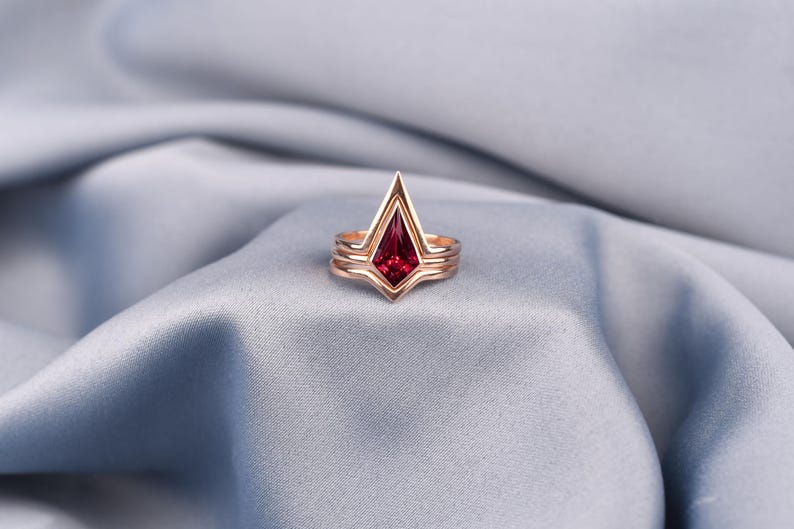 Unique red ruby stackable ring with sculptural three-band design, rose gold plated sterling silver jewelry for women