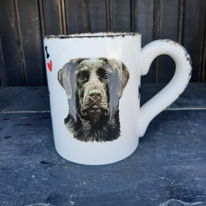 Black Labrador retriever ceramic coffee mug with hand painted paw prints