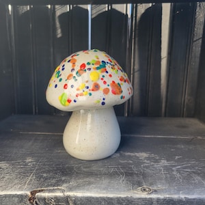 Small multi colored ceramic garden mushroom