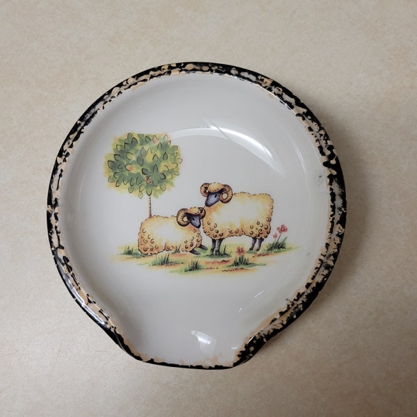 Ram/sheep motif ceramic scoop style spoon rest with hand sponged black and brown trim