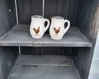 Rooster motif ceramic salt and pepper shakers with hand sponged black and brown trim