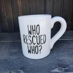 Ceramic &quot;Who Rescued Who&quot; hand stenciled mug
