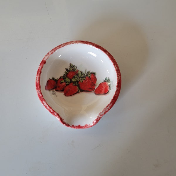 Strawberry motif scoop style ceramic spoon rest with hand sponged red trim