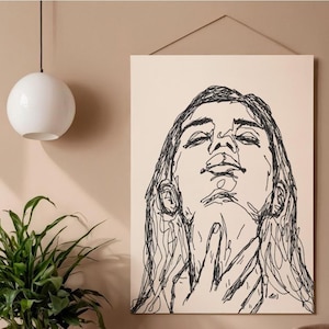 Può includere: Una stampa artistica da parete rettangolare che presenta un disegno a linee nere di una persona che guarda verso l'alto con la mano appoggiata sul collo. L'opera è realizzata in uno stile a schizzo continuo ed espressivo su fondo beige chiaro.