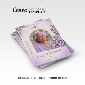 May include: A bi-fold funeral program template with a light purple watercolor background, featuring a central oval frame containing a photograph of an older woman. The text reads Celebrating the Life of Evelyn Grace Carter, March 8, 1946 - July 18, 2024.