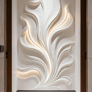 May include: A white wall sculpture featuring fluid, organic, wave-like relief patterns that extend vertically. The textured surface is illuminated by integrated warm lighting tucked within the deep curves, creating shadows and highlights across the wall.
