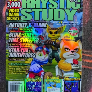 May include: A holographic magazine cover titled Rhystic Study, issue 94 from December 2002. The cover features characters from Ratchet & Clank, Blinx: The Time Sweeper, and Star Fox Adventures, with text highlighting video game secrets and tips.