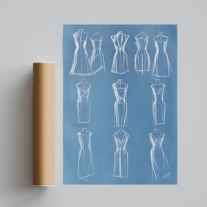 May include: A blue poster featuring white line sketches of eleven different dress silhouettes arranged in three rows. Beside the poster is a cylindrical brown cardboard shipping tube. The sketches show various necklines and skirt shapes.